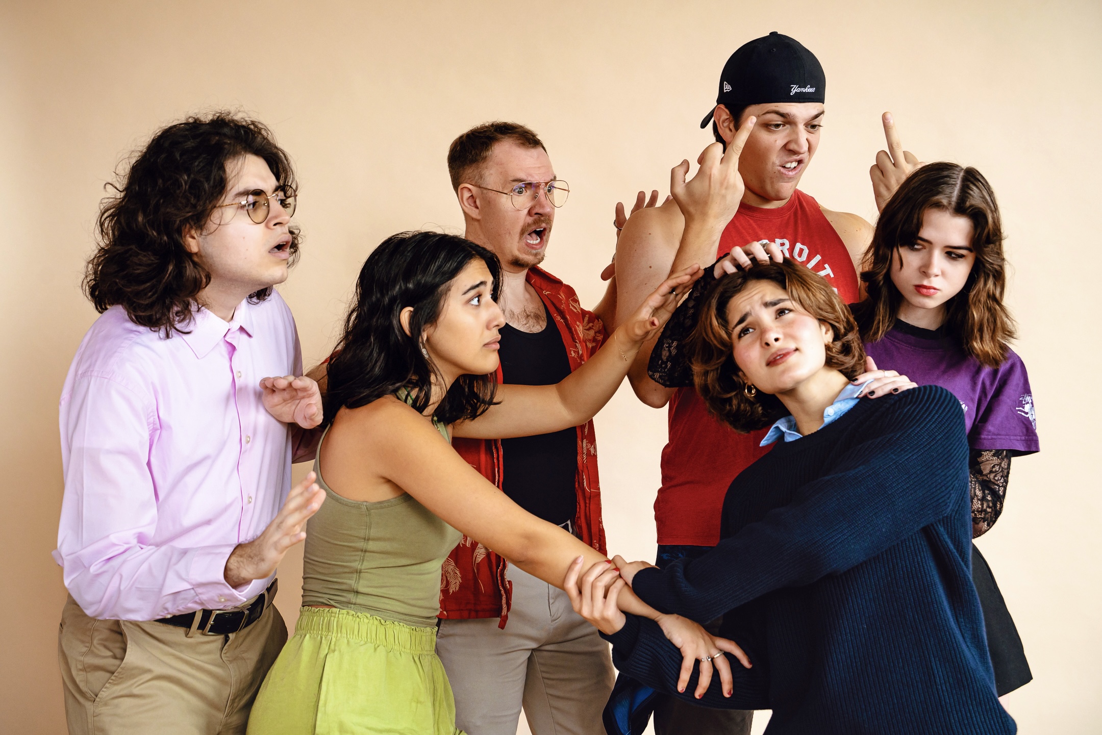 Cast members sharing a quiet moment offstage